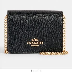 Coach mini wallet on a chain